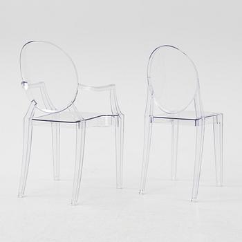 A 'Louis Ghost' armchair and 'Victoria Ghost' chair by Philippe Starck, Kartell.