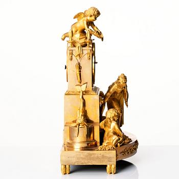 An Empire ormolu mantel clock 'La fontaine de l'Amour', early 19th century.