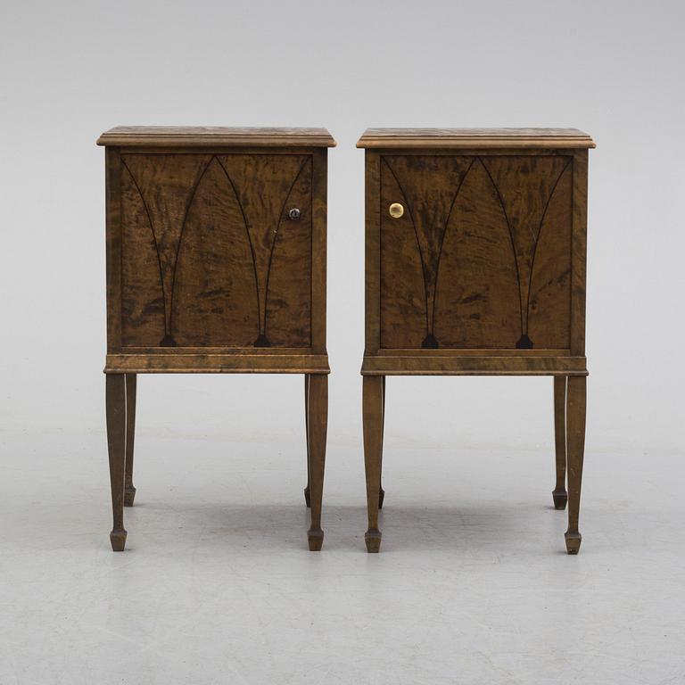 a pair of Art Déco bedside tables.