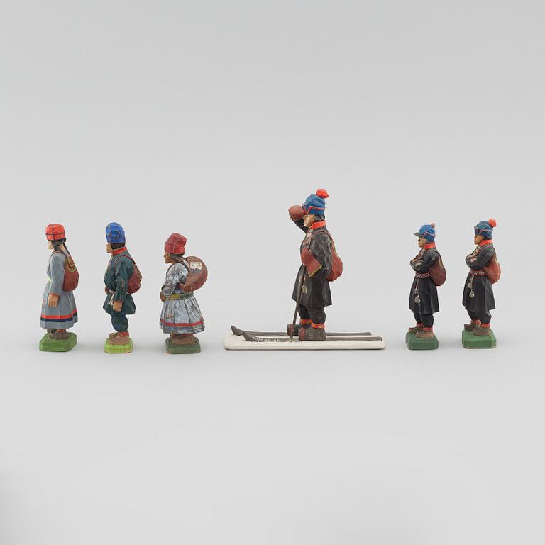 Six wooden figurines by Lars Enarsson, signed L.E.