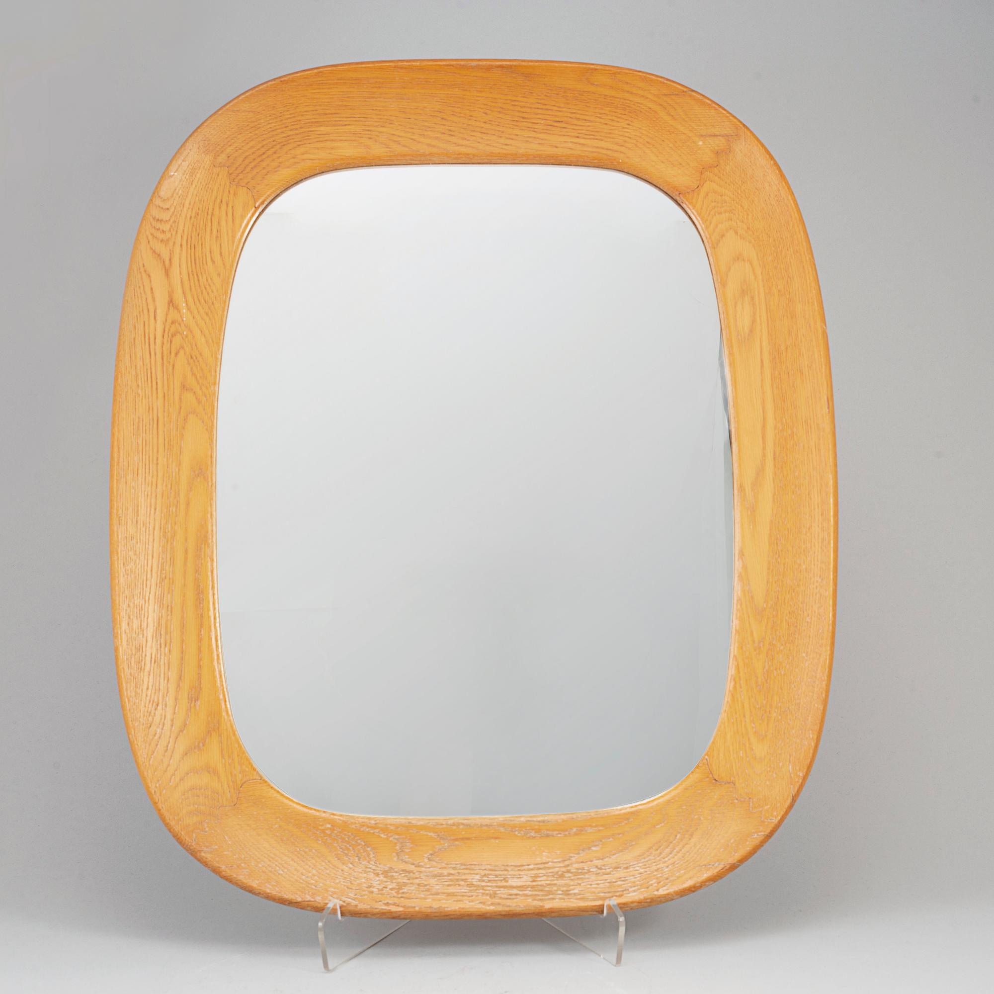 An oak mirror  Fröseke, AB Nybrofabriken, mid 20th Century.