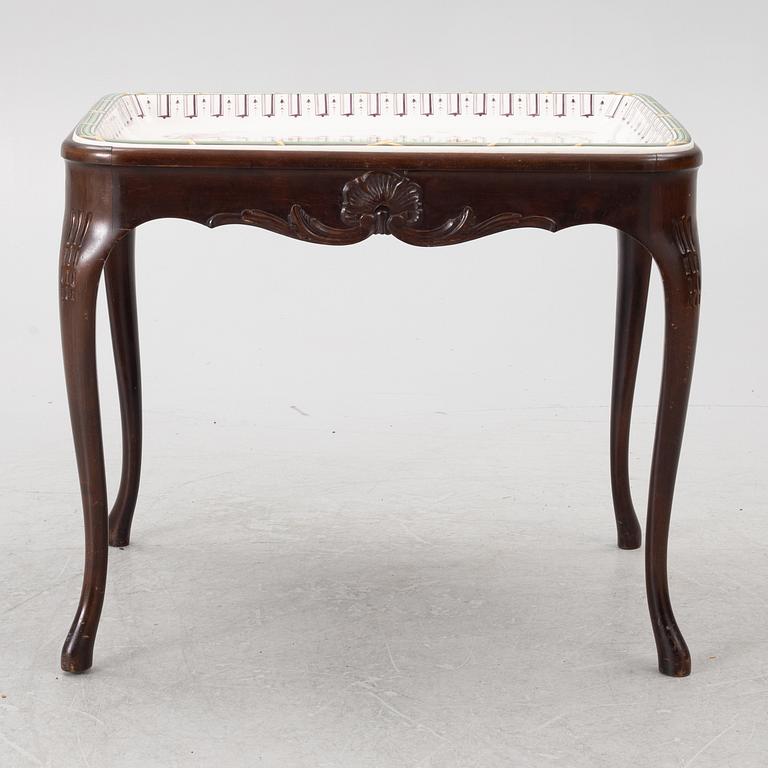 A Rococo-style tea table, Rörstrand, Sweden, 1910's.
