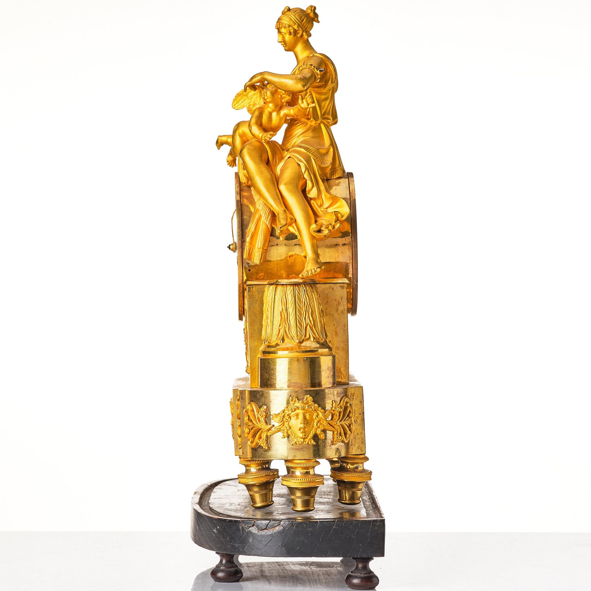 A French Empire 19th century gilt bronze mantel clock.