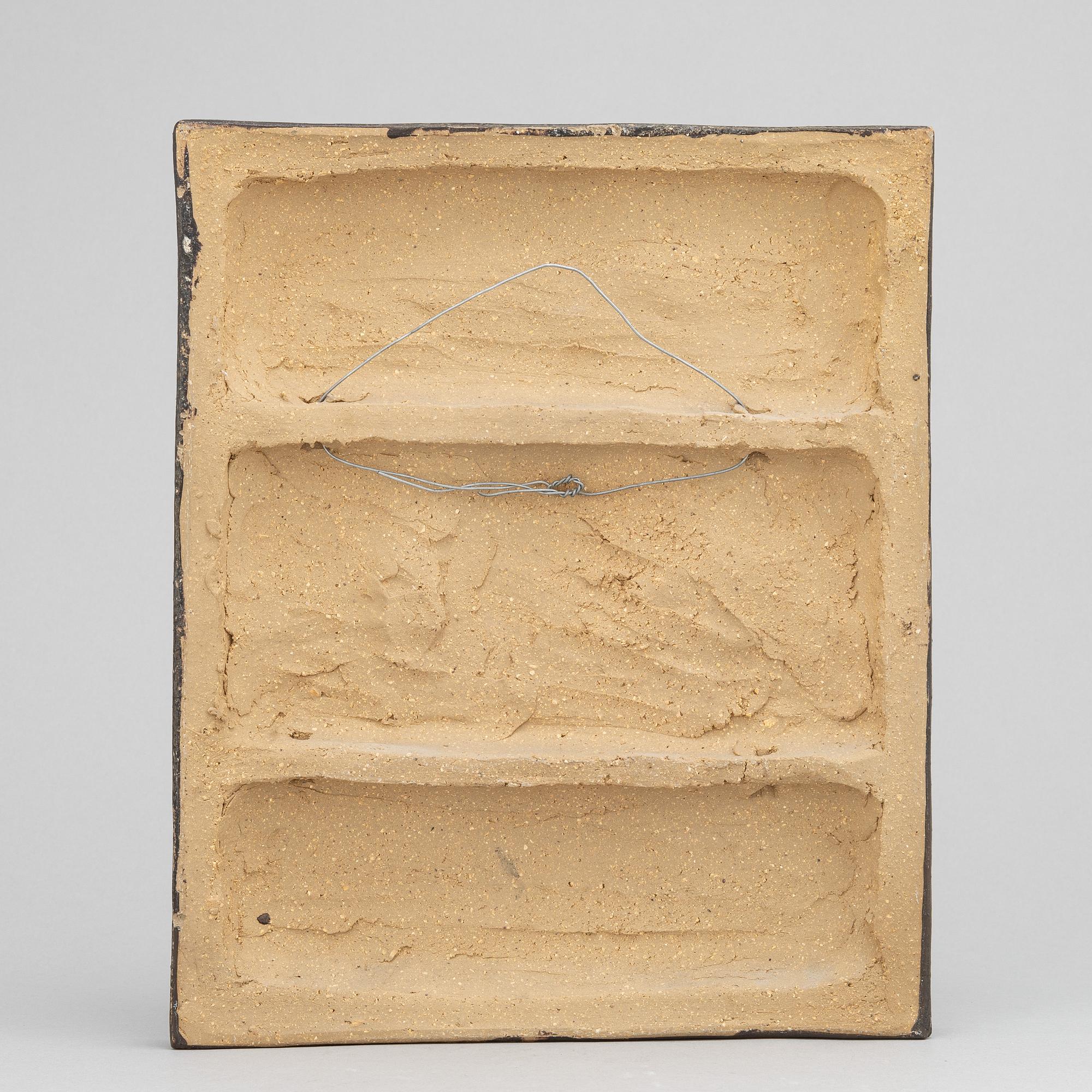 Åke Holm, a stoneware wall relief, signed.