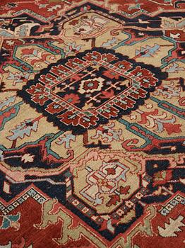 A CARPET, an antique Heriz, 476,5 x 344,5 cm.