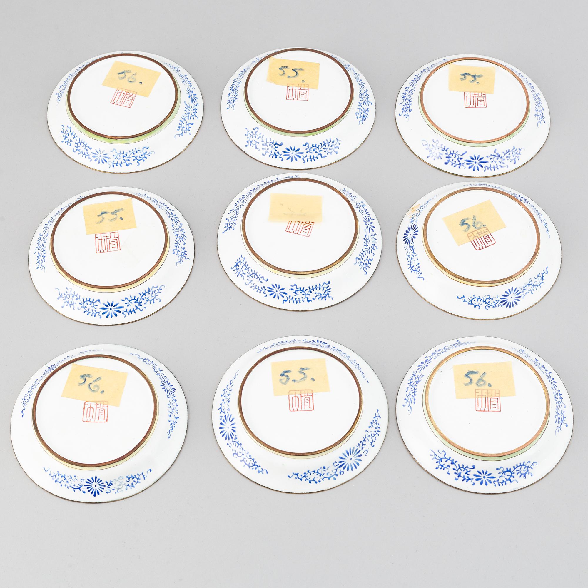 A set of 9 enamel on copper dishes, early 20th Century.