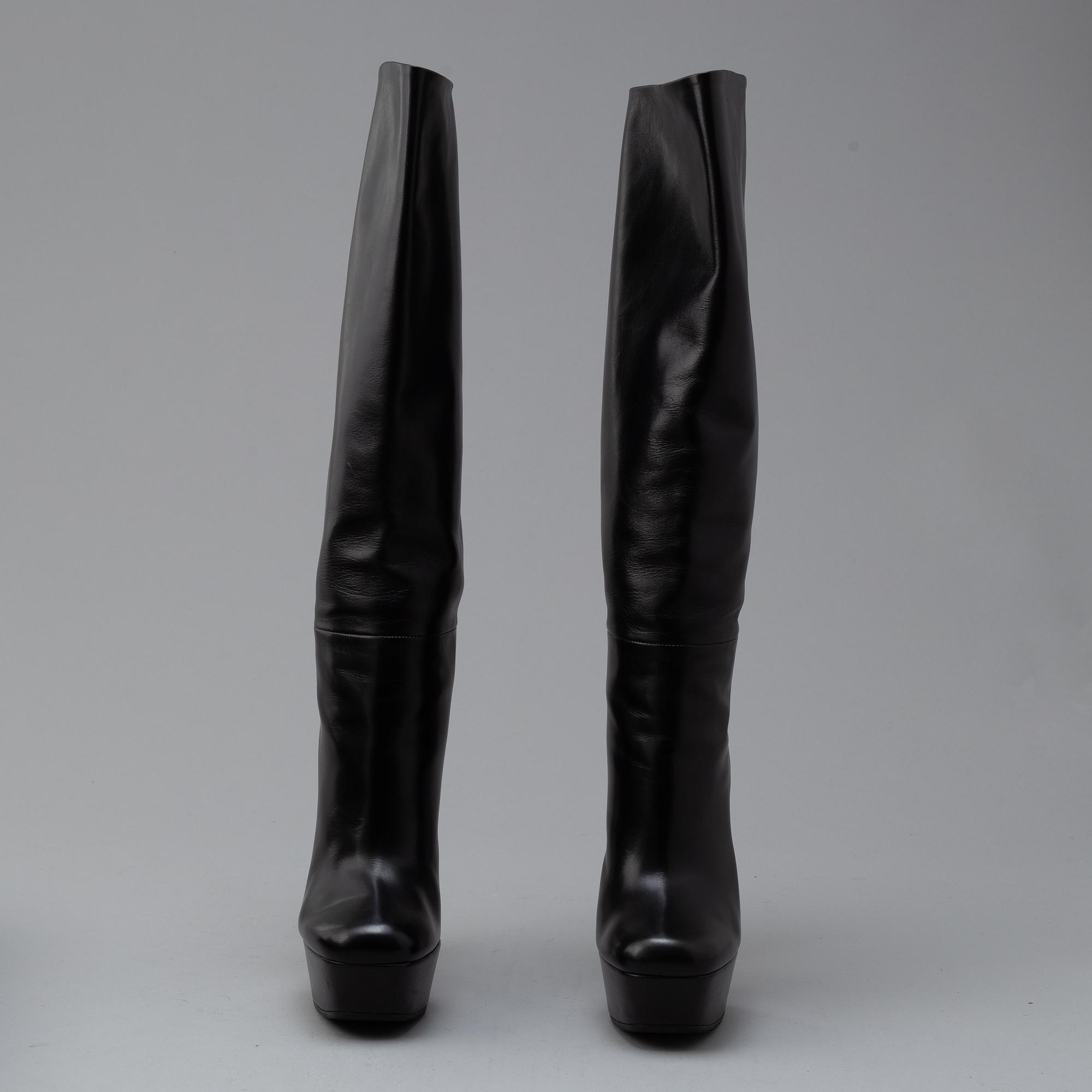 GUCCI, a pair of platform, high heel leather boots, size 37½.