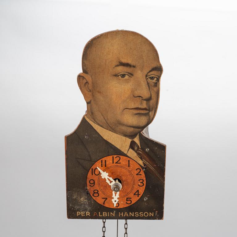 A wall clock bearing the portrait of Per Albin Hansson, first half of the 20th century.