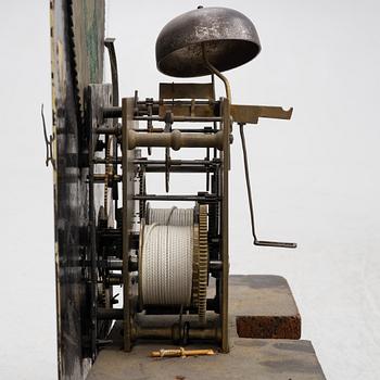 A long-case clock, England, 19th century.