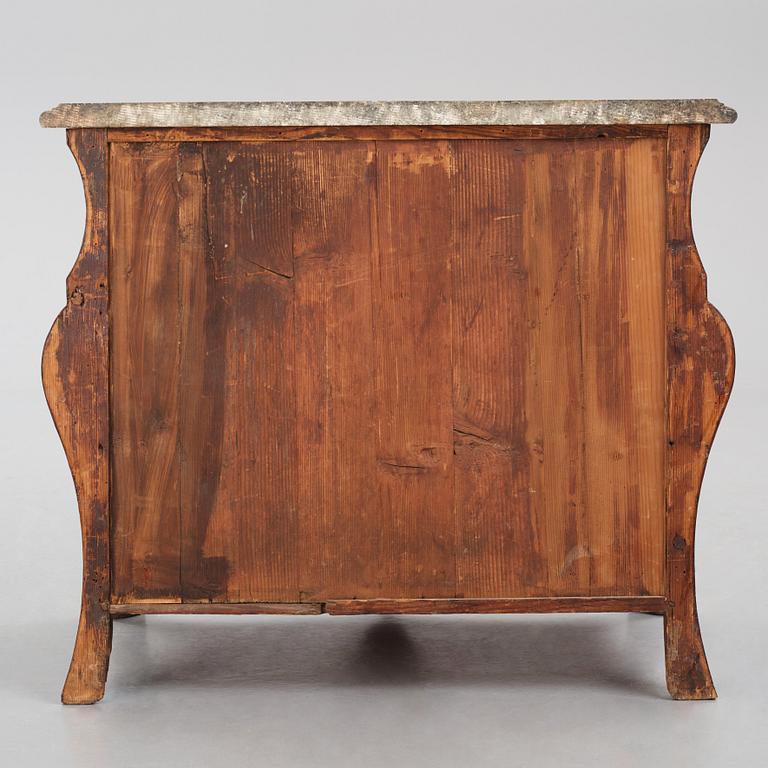 A Swedish early rococo parquetry, ormolu-mounted and marble commode, presumably by S. Pasch or J. Wulf , ca. 1740.