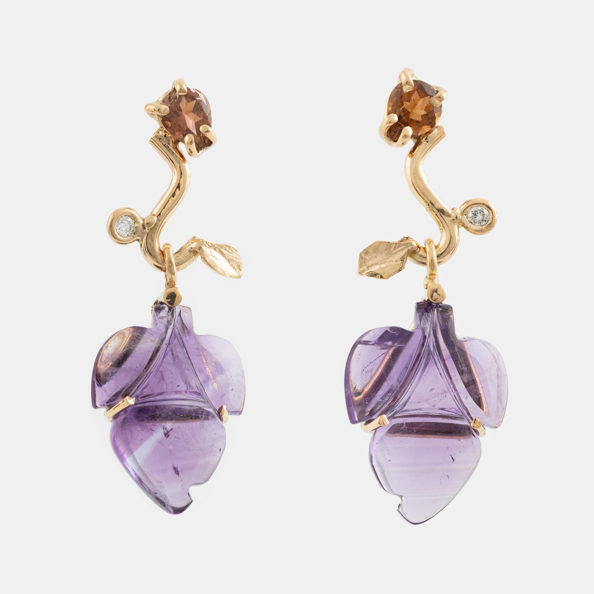 Carved amethyst, tourmaline and brilliant cut diamond earrings.