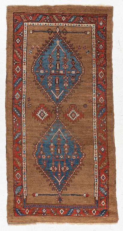 An antique Sarab rug, northwestern Iran, c. 213 x 107 cm.