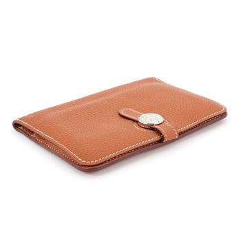 HERMÈS, a brown leather wallet, "Dogon".