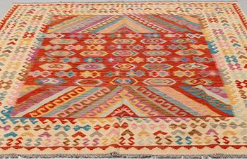 A CARPET, kilim, around 299 x 253 cm.