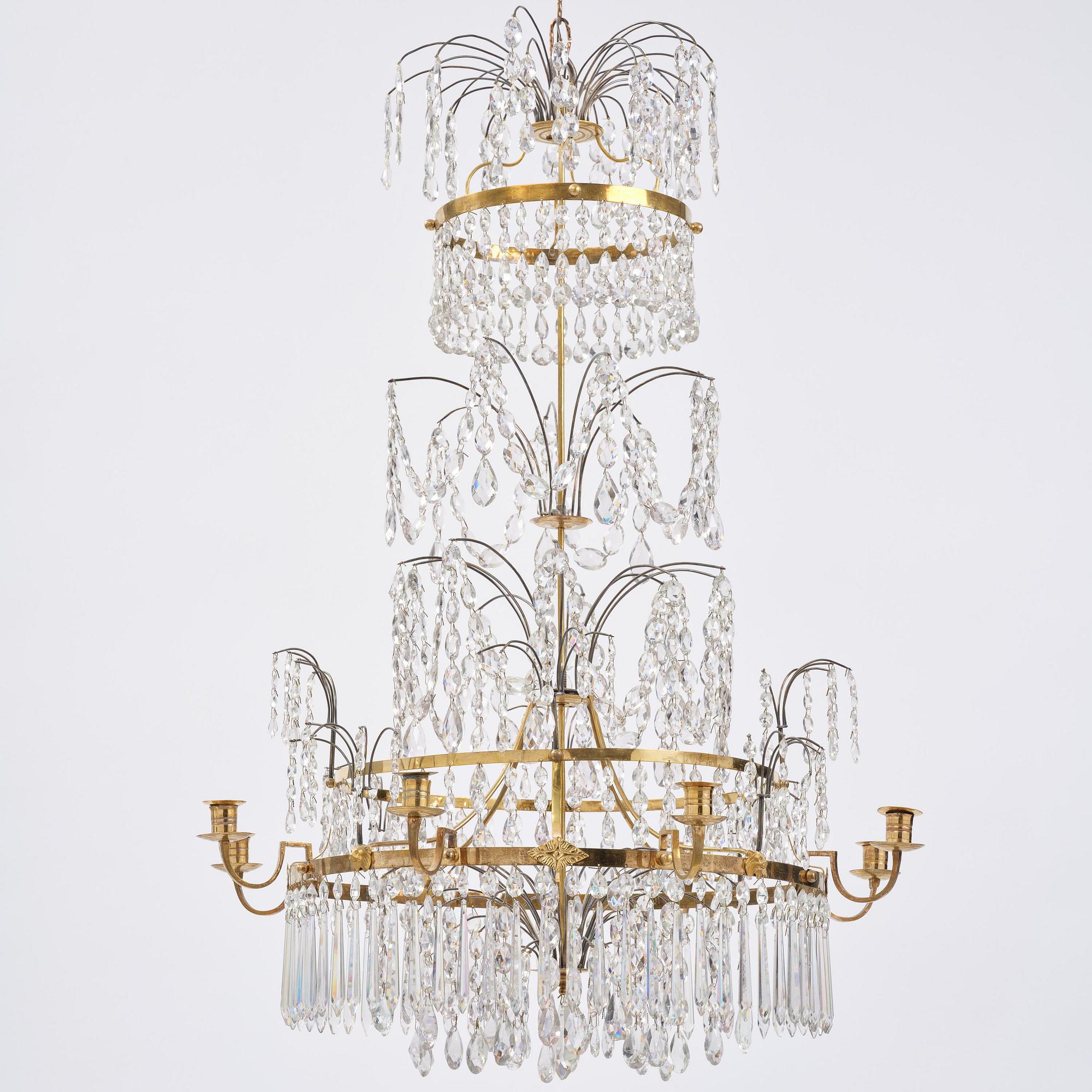 A late Gustavian gilt brass and cut glass eight-branch chandelier, Stockholm, late 18th century.