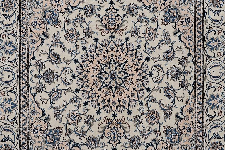 A rug, Nain, part silk, ca 200 x 195 cm.