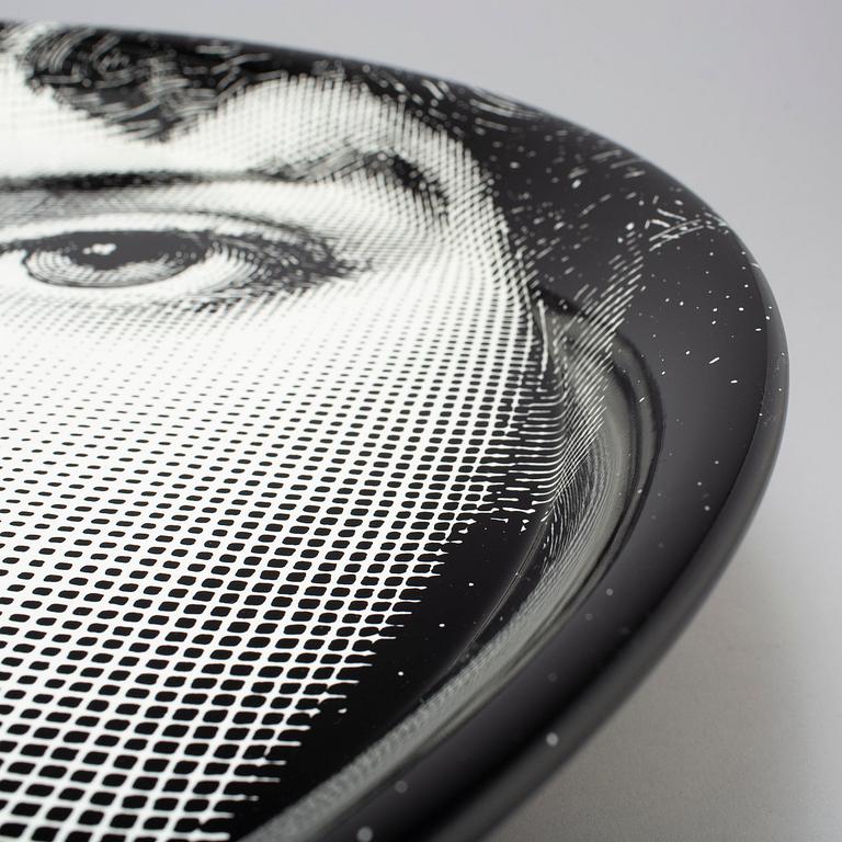 PIERO FORNASETTI, a tin tray, numbered 27, dated 2013.