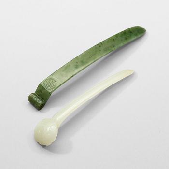 585. Two Chinese nephrite hairpins, 20th Century.