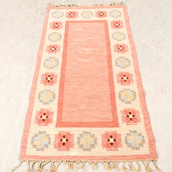 Ingegerd Silow, a signed flat weave carpet approx 163x84 cm.