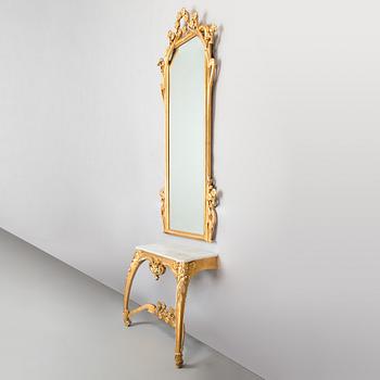 An Art Nouveau mirror with console table from early 20th century.