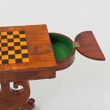 A Swedish Empire mahogany games' table attributed to J. Öman (master in Stockholm 1815-33).