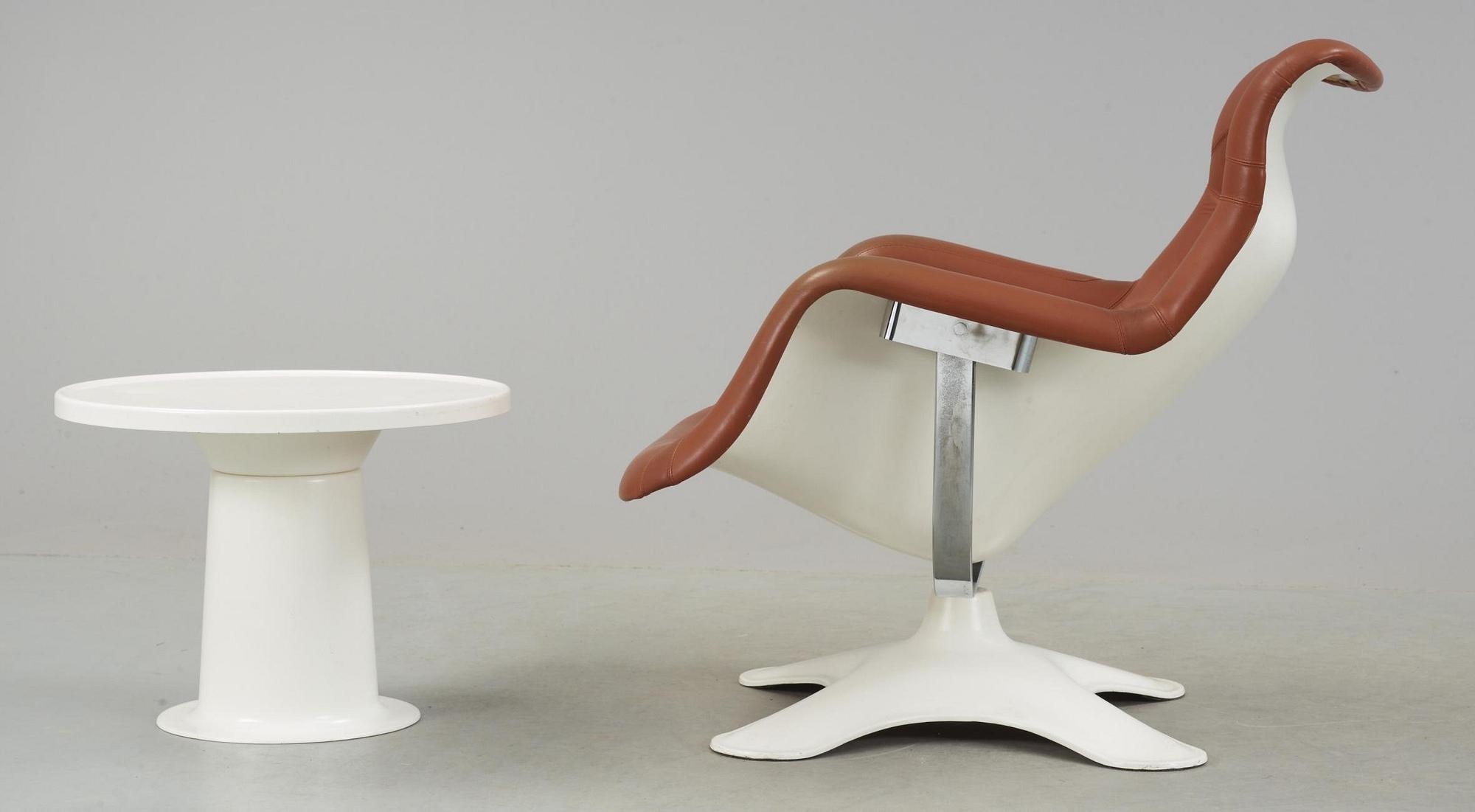 A Yrjö Kukkapuro 'Karuselli' easy chair and a 'Saturnus' table, Haimi, Finland 1960-70's.