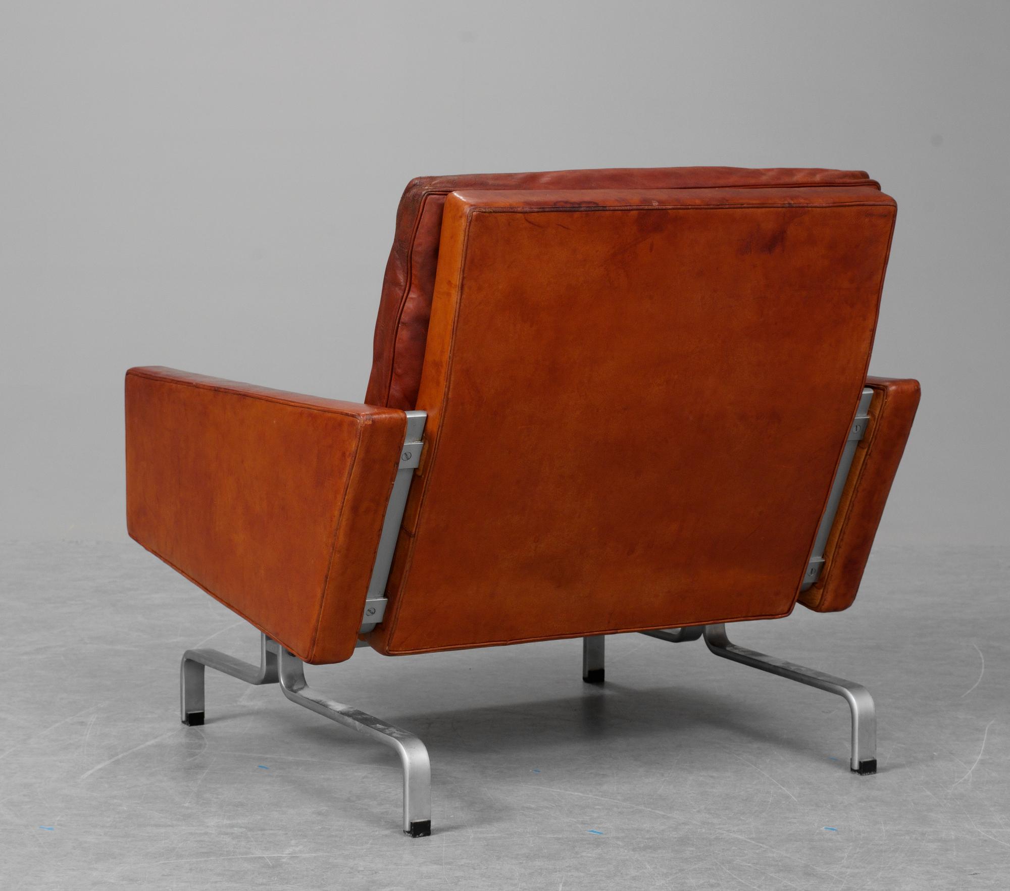 A Poul Kjaerholm brown leather and steel armchair "PK-31", E Kold Christensen, Denmark, 1960's, maker's mark in the steel.