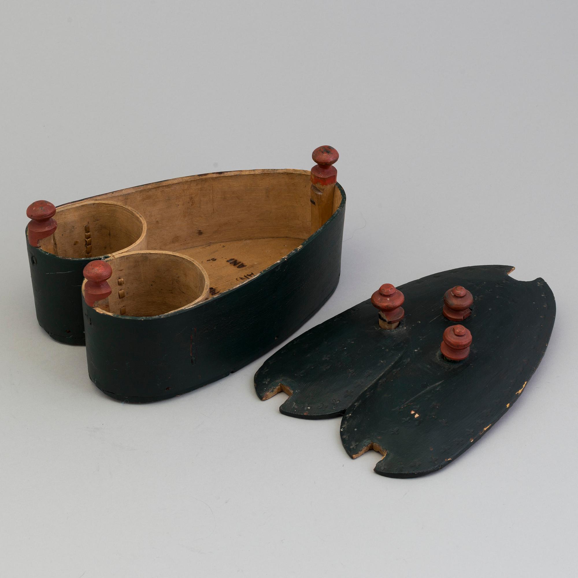 A 19th century folks wooden box in the shape of a loveheart, signed ANS.