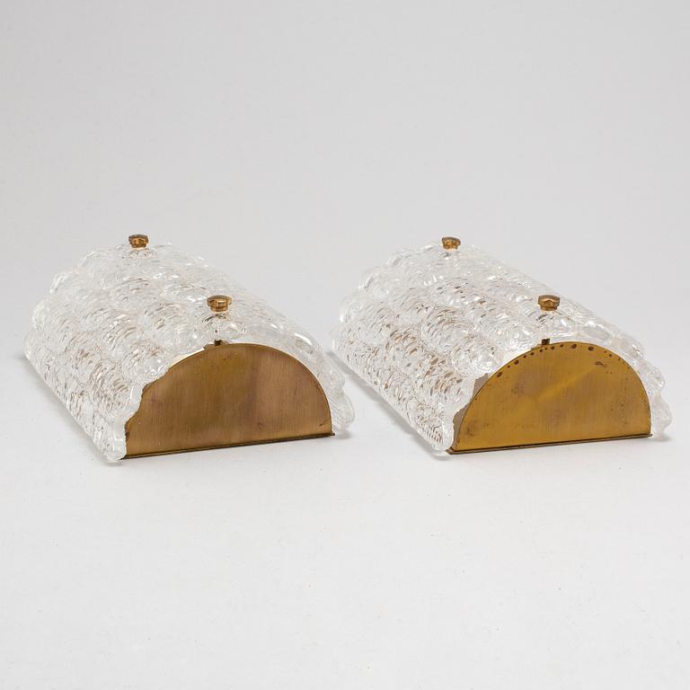 A PAIR OF WALL LAMPS BY CARL FAGERLUND FOR ORREFORS.