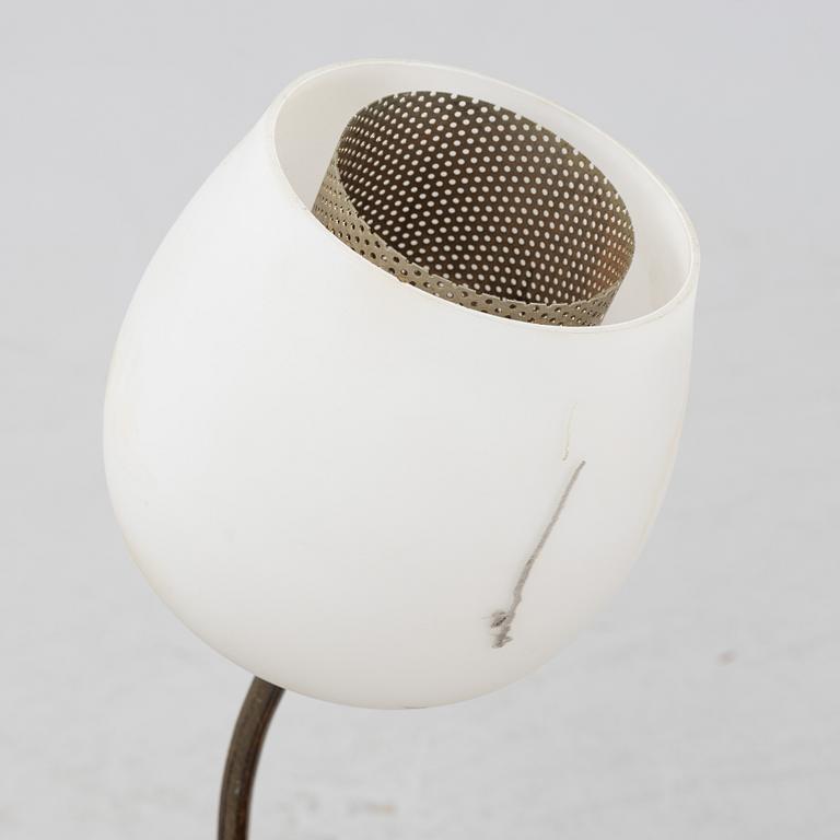 A mid century modern table lamp.