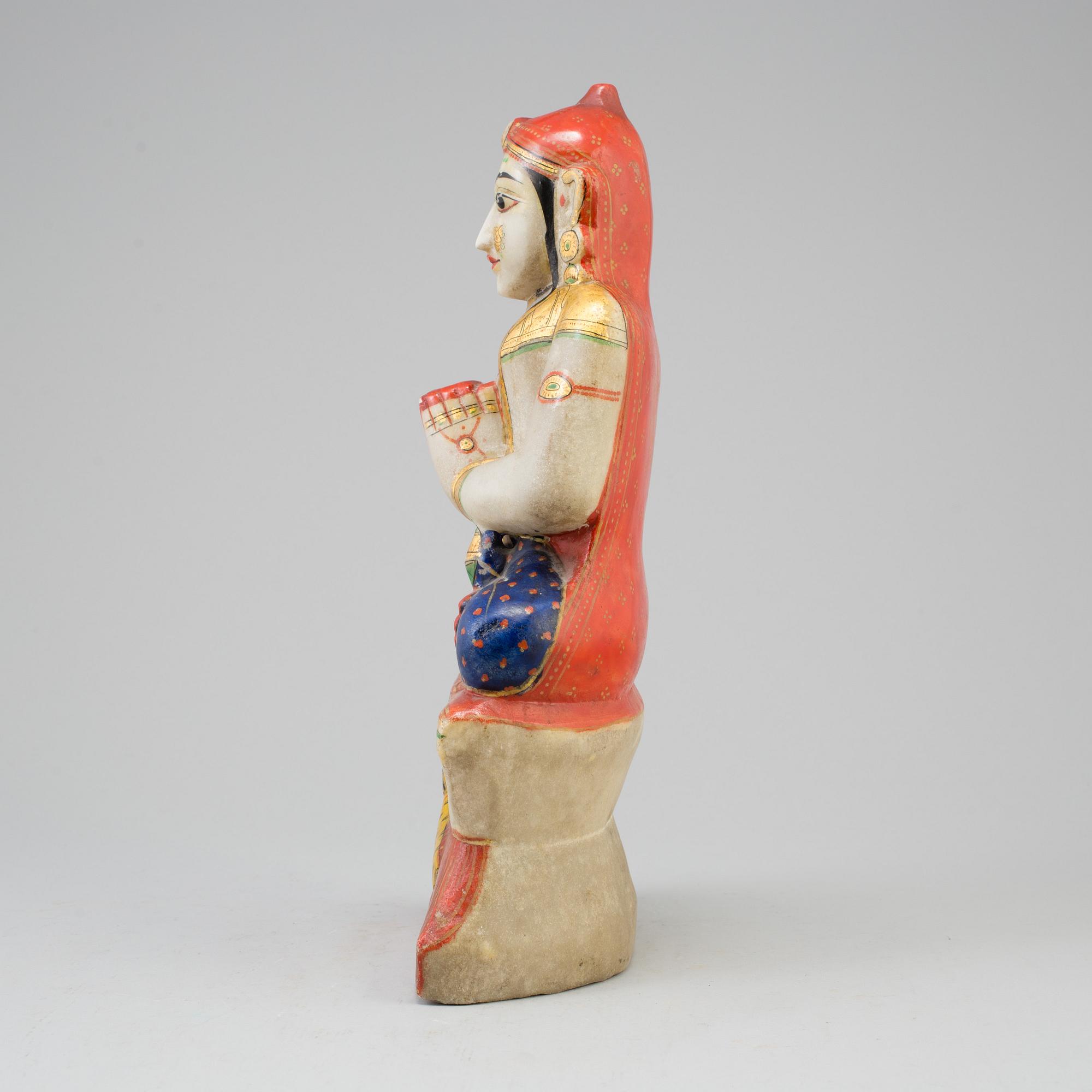 An alabaster sculpture of a deity, India, 20th Century.