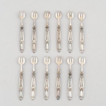 Ostrongafflar, 12 st, silver, Paris, Frankrike omkring år 1900.