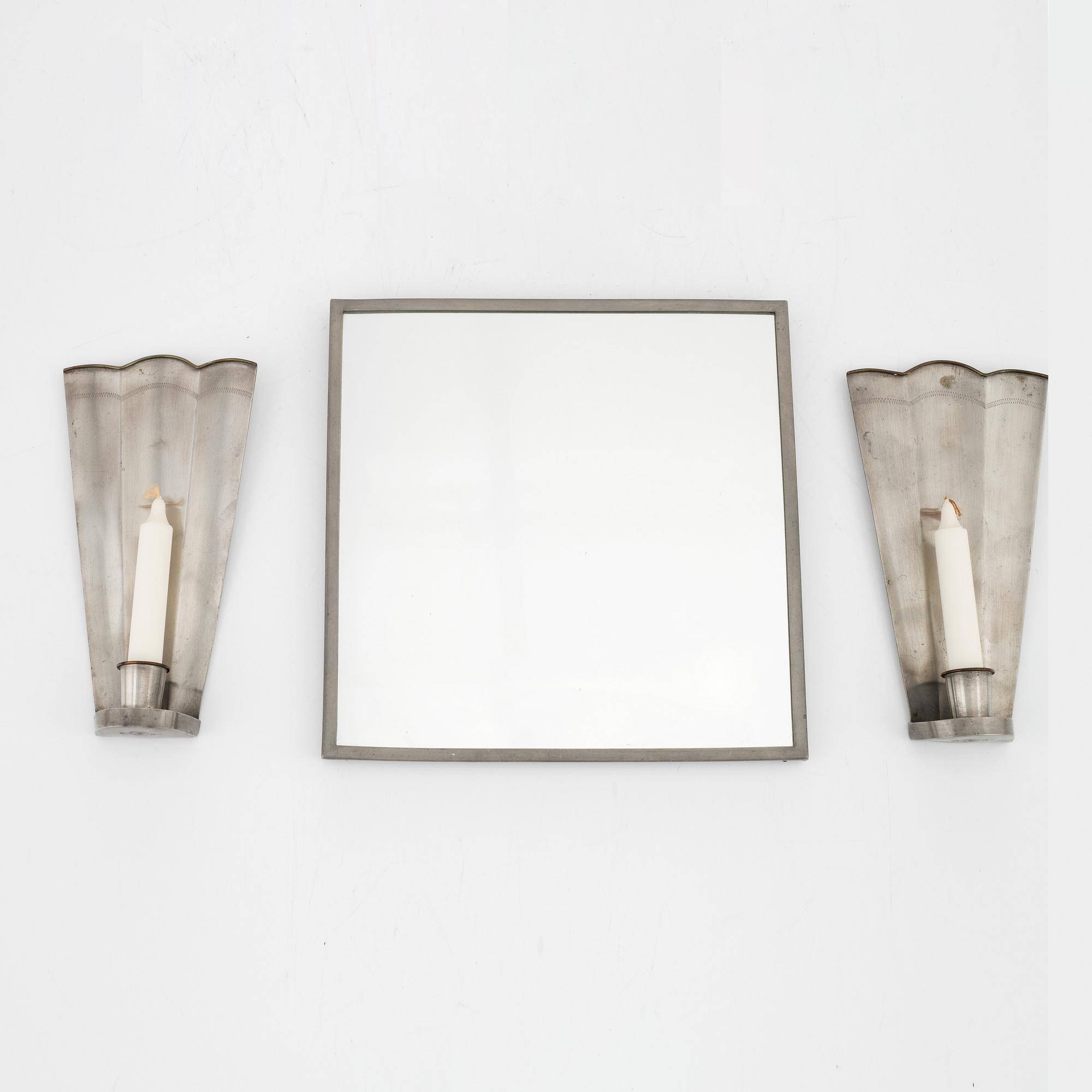 Nils Fougstedt, A pair of pewter sconces and a mirror, Firma Svenskt Tenn, 1940 and -29.