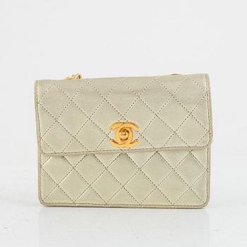 Chanel, micro flap bag, 1989-1991.