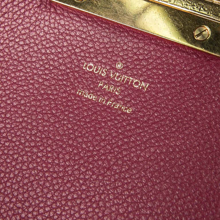 A bag, "Olympe Aurore" by LOUIS VUITTON.