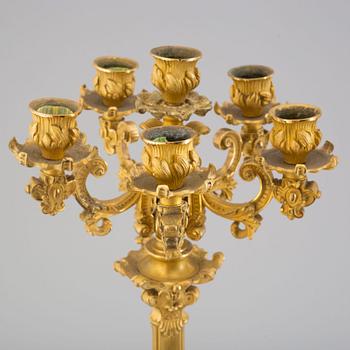 A pair of early 20th century bronze candelabras.