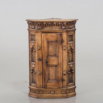 A 18th century corner cabinet.