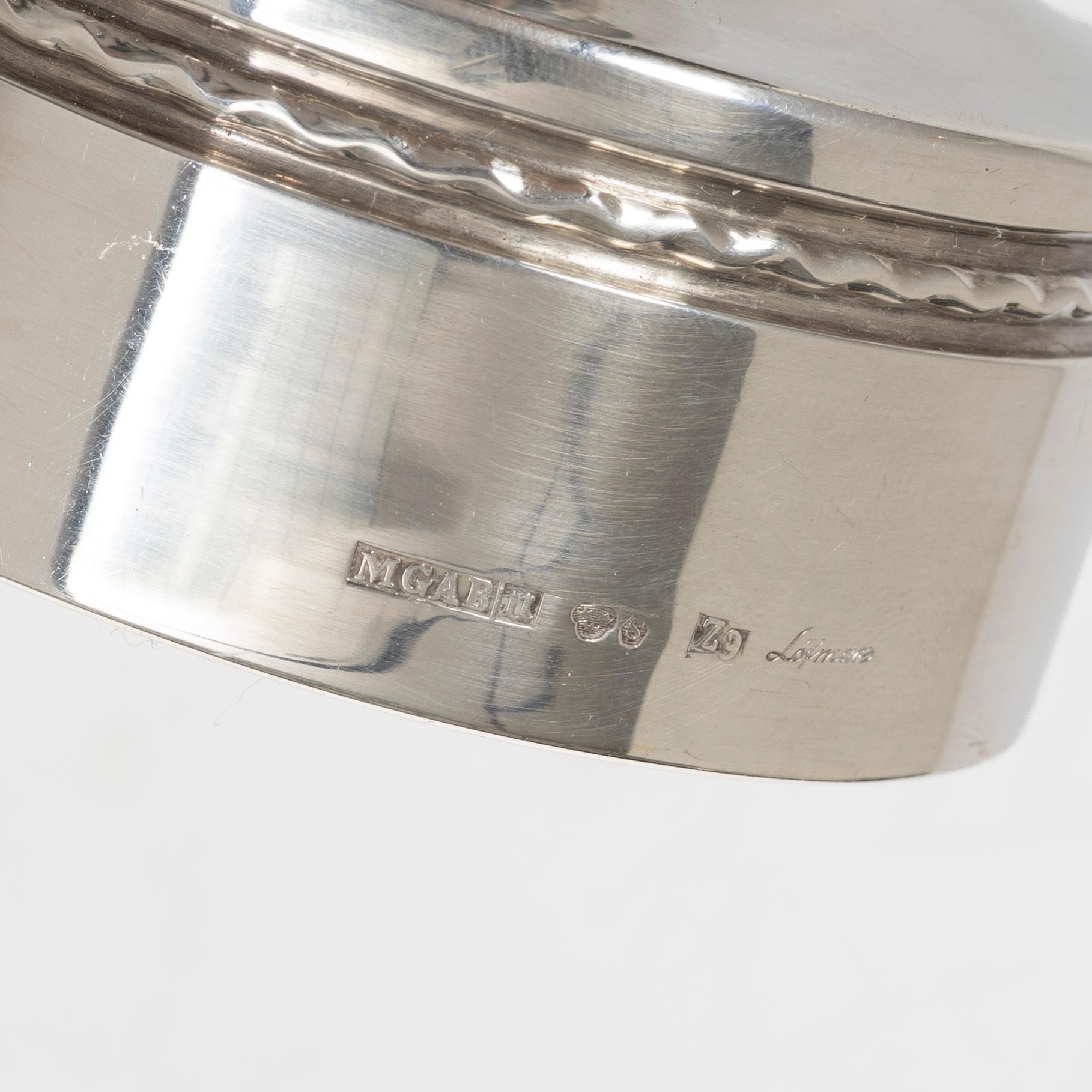 Eric Löfman, A pair of silver candlesticks, MGAB, Uppsala 1974.