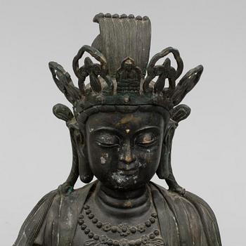 A mid 20th century metal Guan Yin figurine, China.