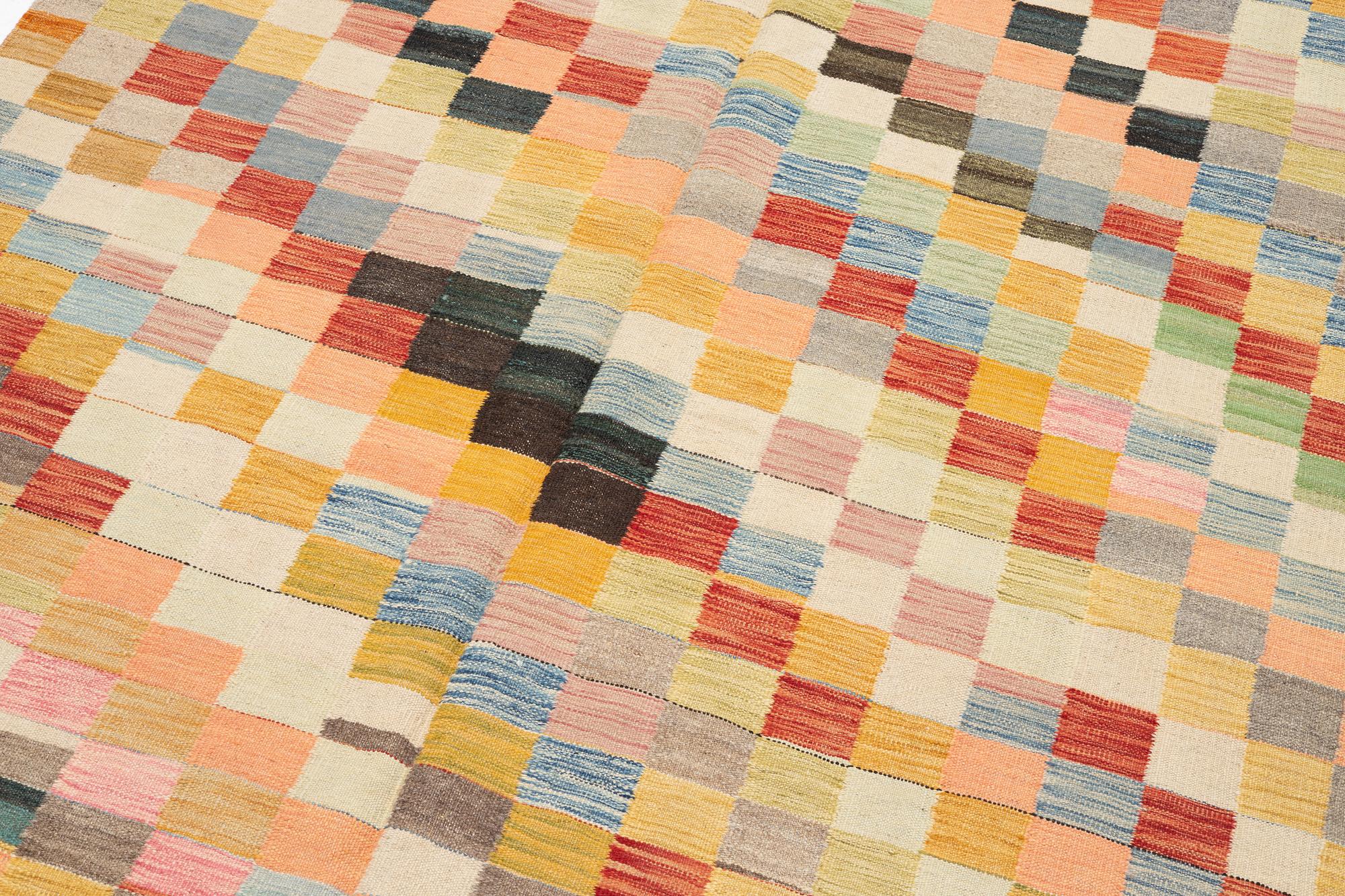 A Kelim carpet, c. 253 x 182 cm.