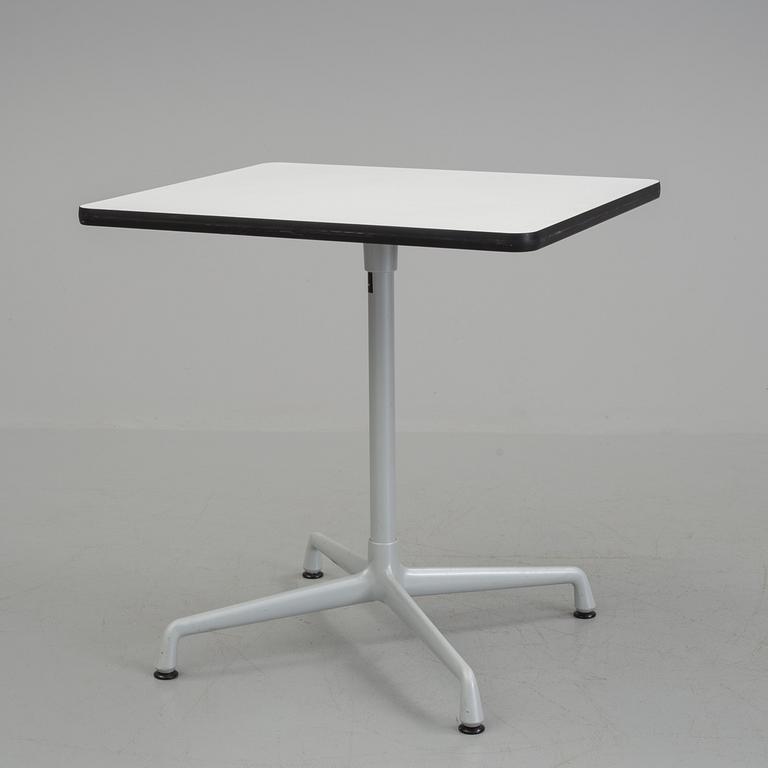 A small "Aluminium group" table by Charles and Ray Eames for Vitra.
