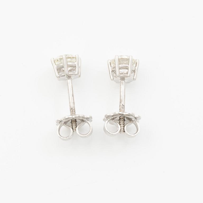 Earrings, single-stone earrings in 18K white gold with brilliant-cut diamonds.