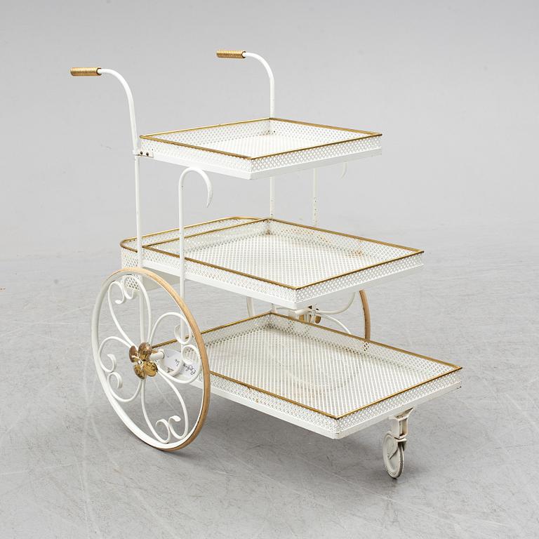 A white lacquered metal and brass serving trolley, 1940's-50's.