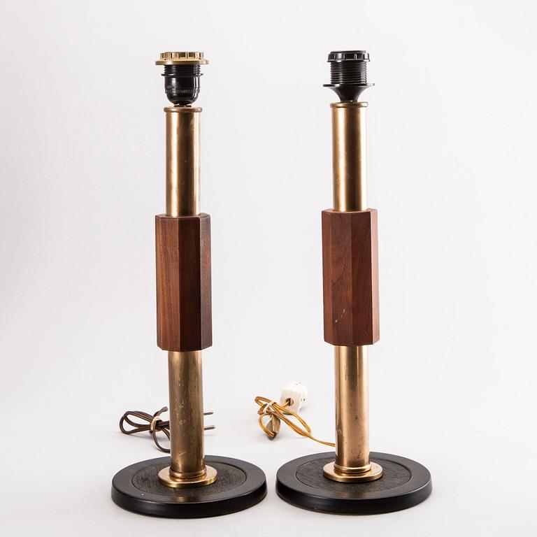 A pair of wood and brass table lamps later part of the 20th century.