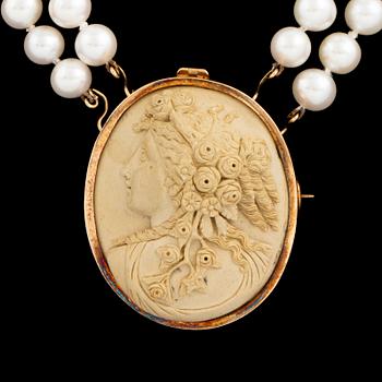 Lava cameo and cultured pearl necklace.