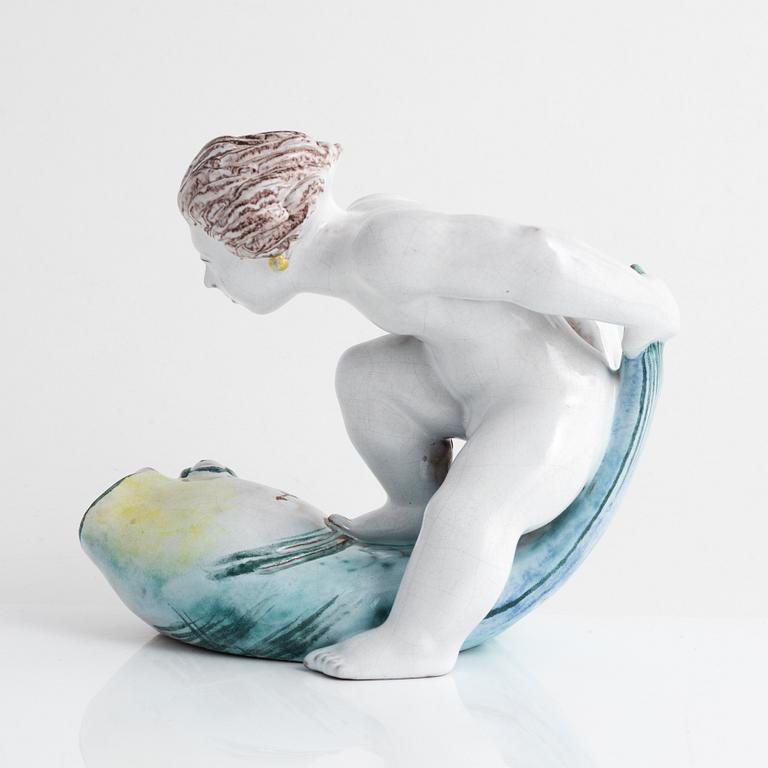 Tyra Lundgren, a faience figurine, Rörstrand, dated -30.