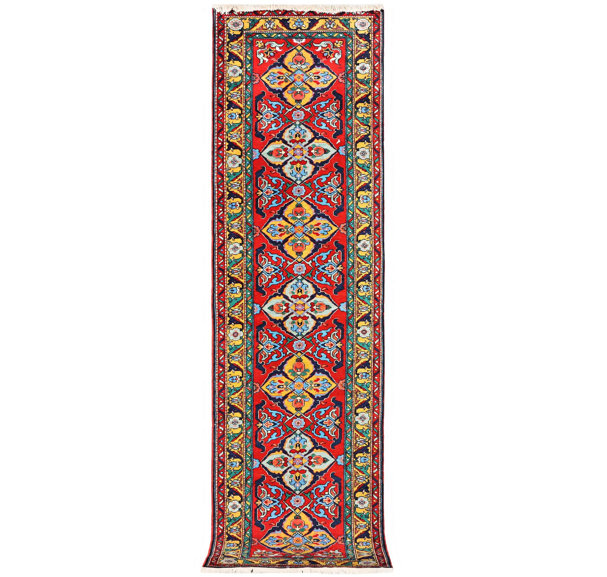 A Kazak runner carpet, c. 344 x 83 cm.