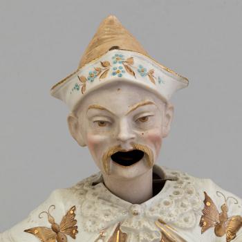 A pair of Chinese style 20th century porcelain nodding figures.