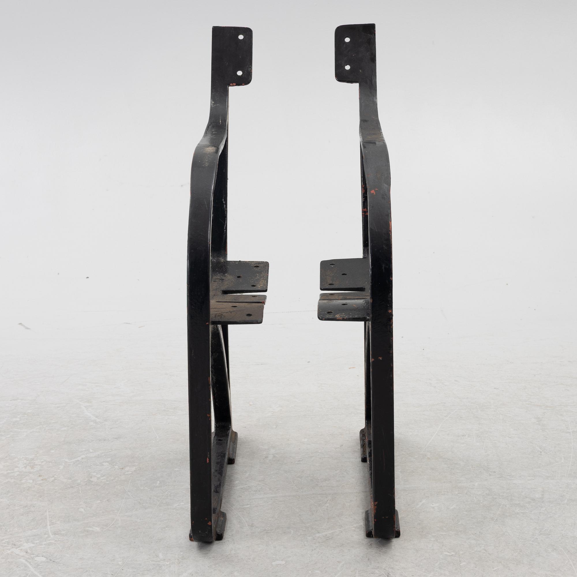 Näfveqvarn, ends for a bench, cast iron, early 20th century.