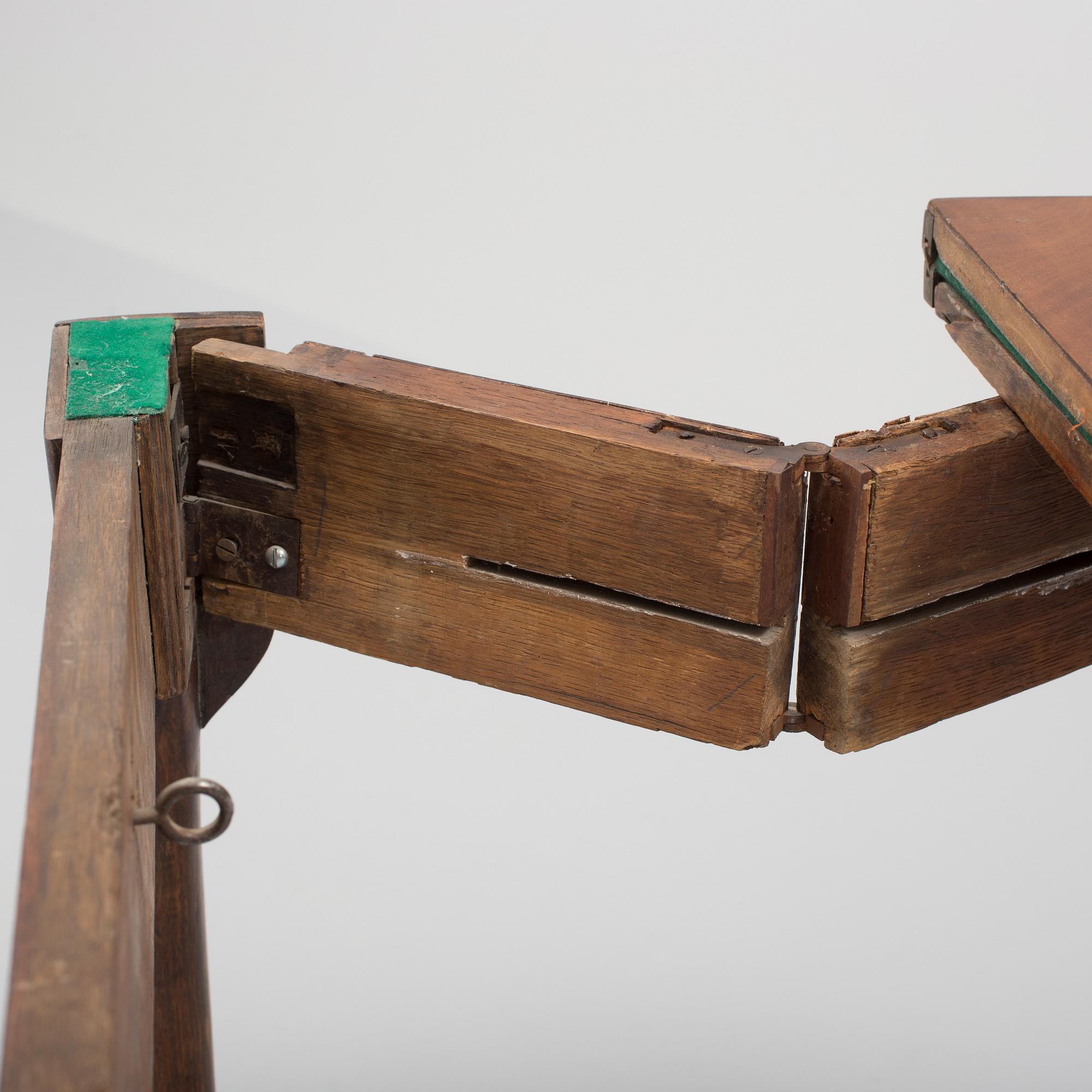 A 19th Century Queen Anne revival concertina action card and gaming table.